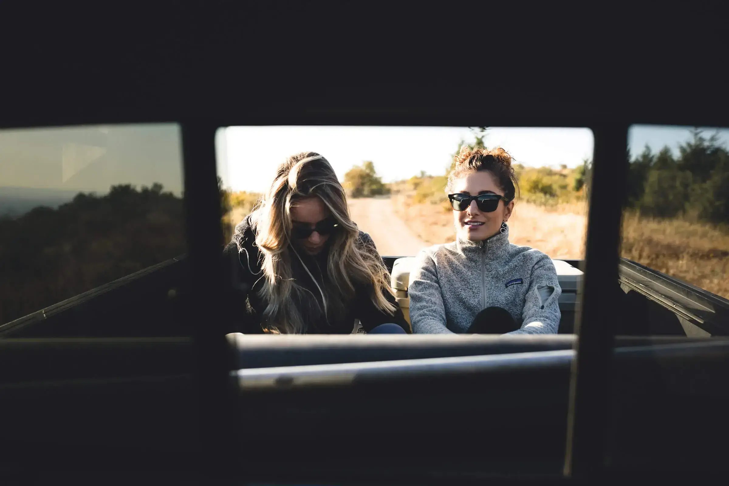 happy customers in back of self drive van for rent