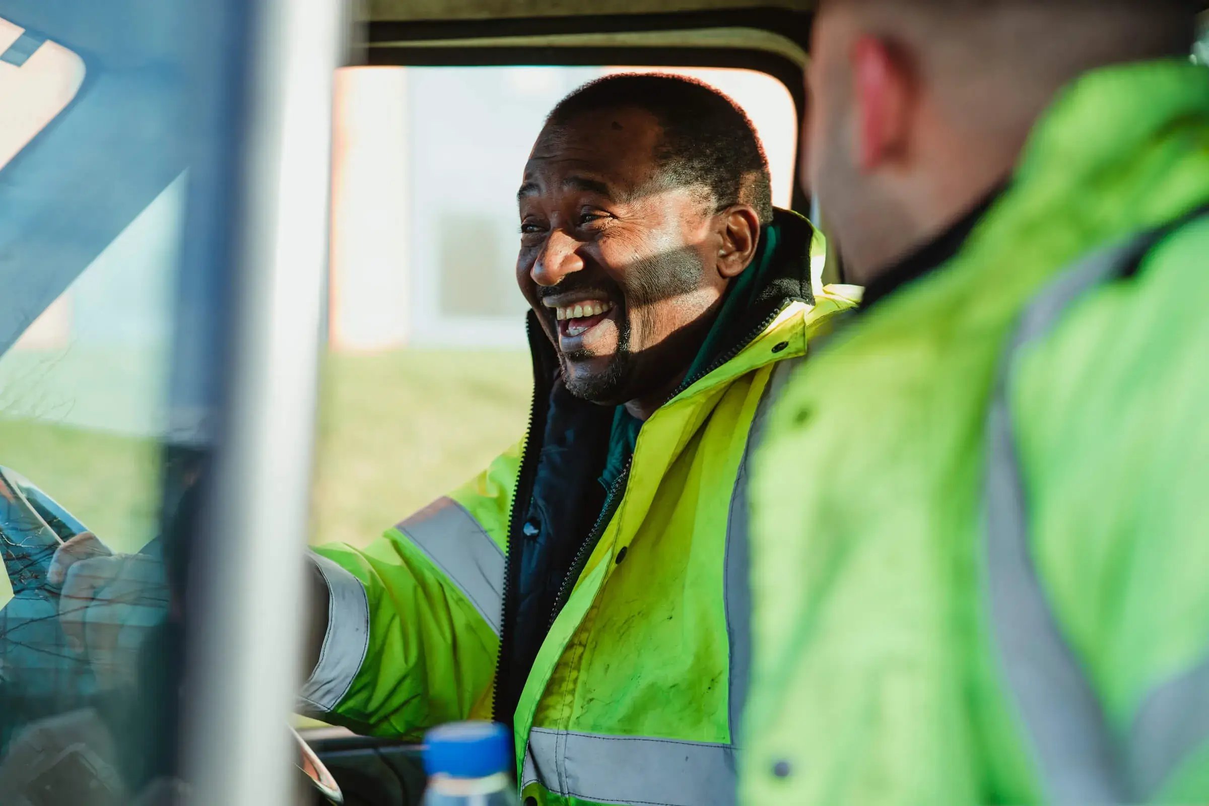 two men in front of luton van for hire